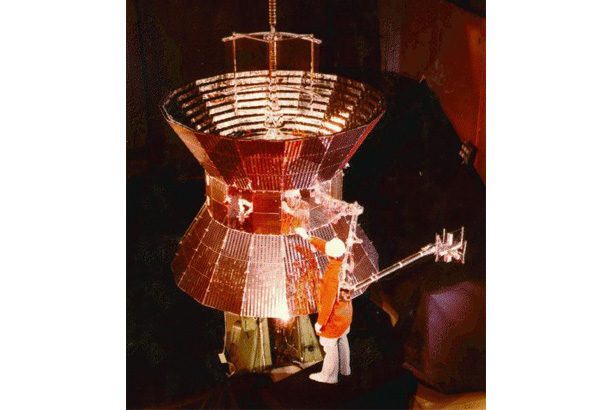 Image of Helios spacecraft with person in front of it