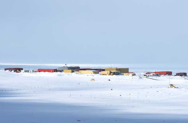 Multiple warehouses set against snow drifts