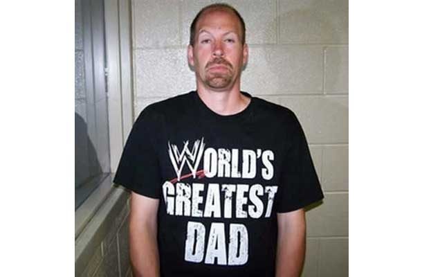 man in shirt that says world's greatest dad