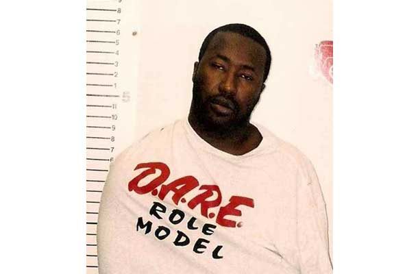 man in shirt that says DARE role model