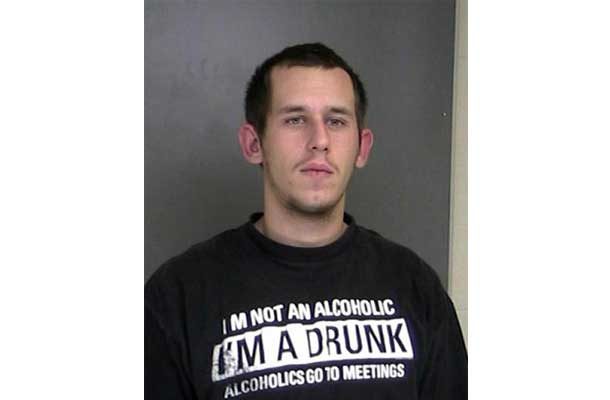 Man in shirt that Says I'm not an alcohol I'm a drunk