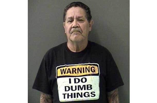 Man in shirt that says I do dumb things
