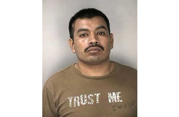 Man with shirt that says Trust Me I'm a liar