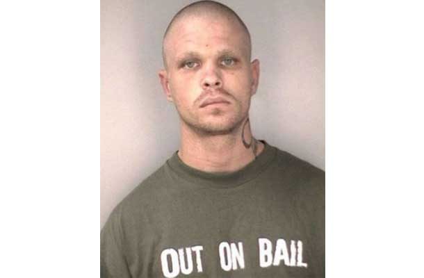 man with shirt that says Out on Bail