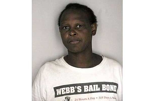 Woman with shirt that says Webb's bail bonds