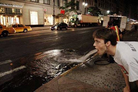 Guy puking water