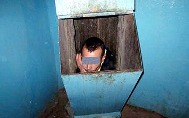 Russian man stuck in rubbish chute trying to flee girlfriend