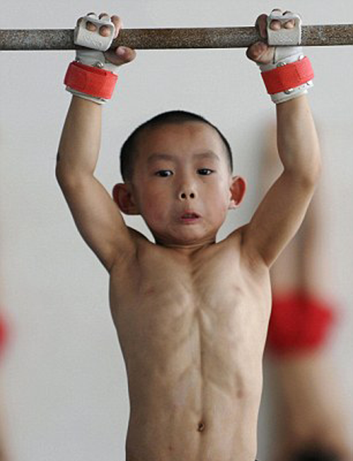 Young Chinese gymnast training