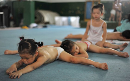 Young Chinese gymnasts stretching