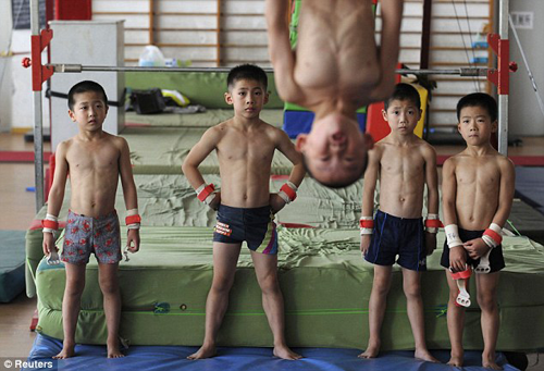 Young Chinese gymnasts in training