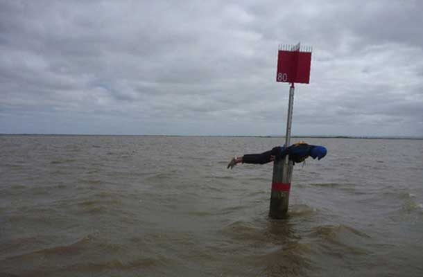 Planking on post in the ocean