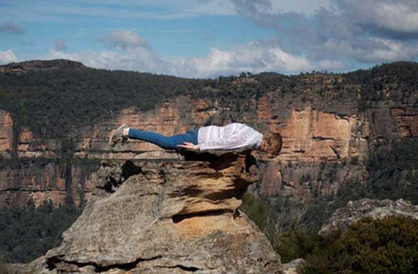 planking on a rock at the grand canyon