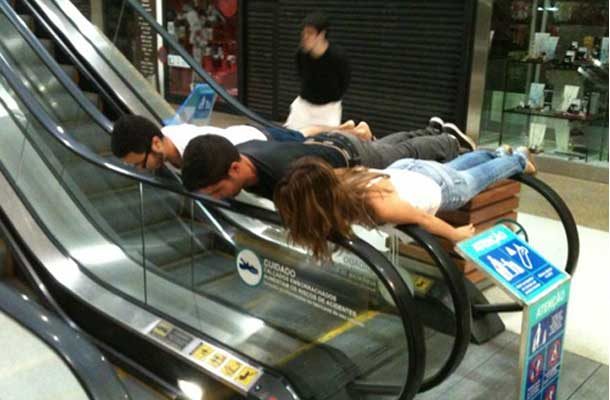 planking on an escalator