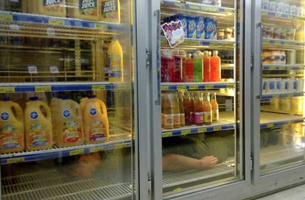 planking in a grocery store fridge