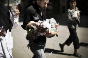 Father carries daughter to the hospital in aleppo