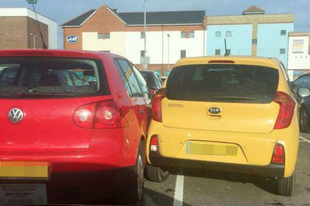 A-badly-parked-car-damaging-the-car-next-to-it-in-Fareham-car-park-in-Portsmouth