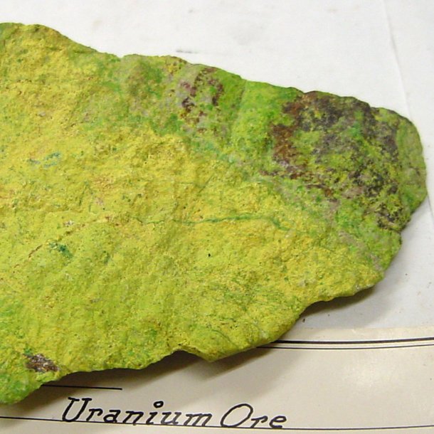 Green chunk of uranium ore