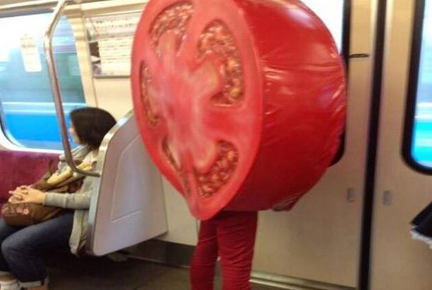 person in sliced tomato costume