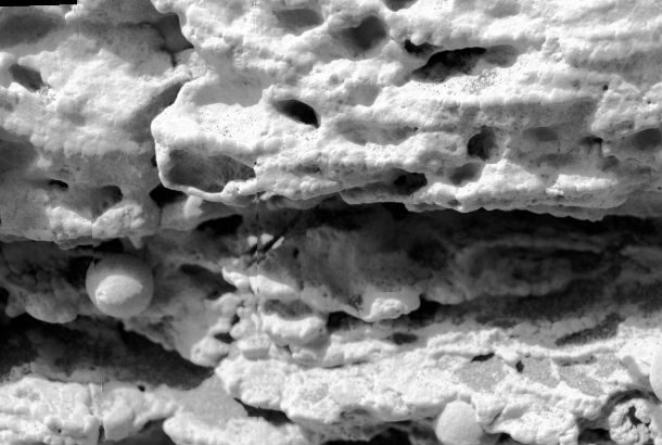 black and white image of porus rock