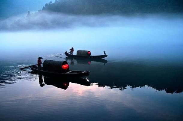 River Ferry Operating in the Early Morning in Xiao Donjiang, China