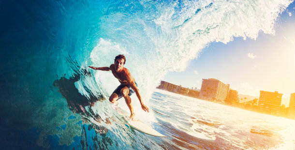 Surfer in a barrel wave