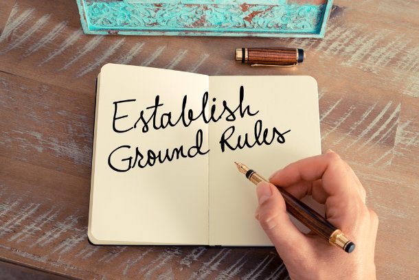 notebook with "establish ground rules" written on page