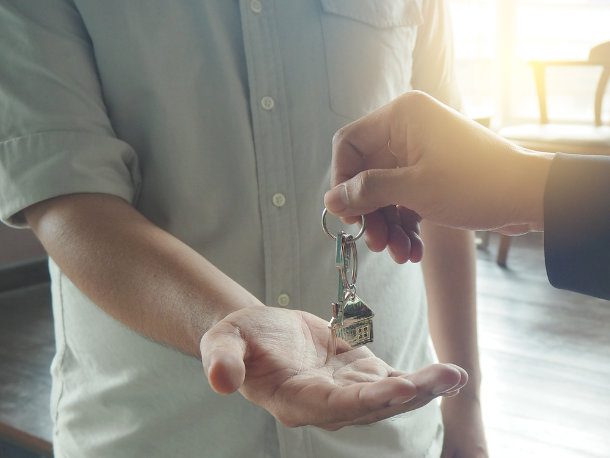 landlord handing keys