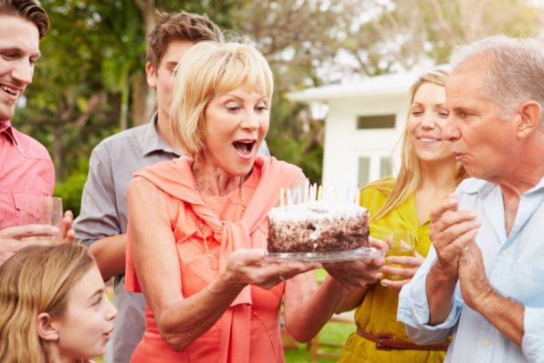 woman surprised by cake