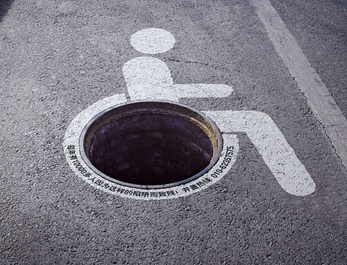 10-manhole-art-hellhole_tn