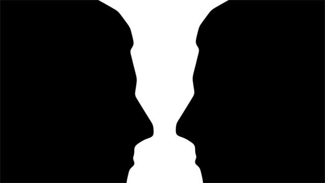 http://en.wikipedia.org/wiki/File:Two_silhouette_profile_or_a_white_vase.jpg