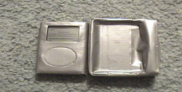 A silver electronic device with a screen
