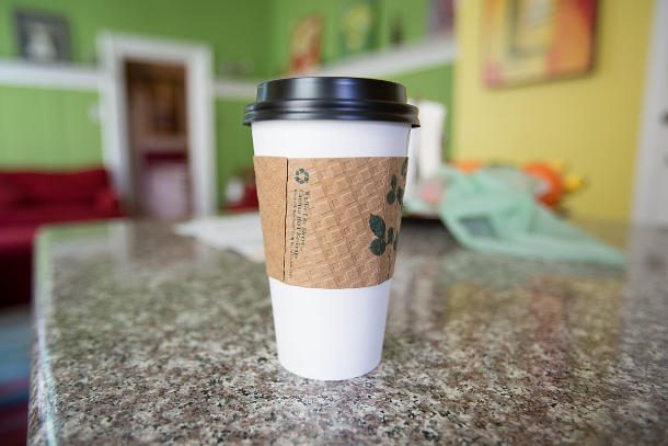 zarf - coffee cup with sleeve on counter