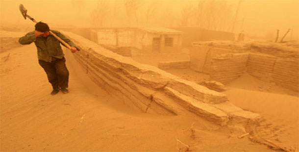 A person standing in a sand storm
