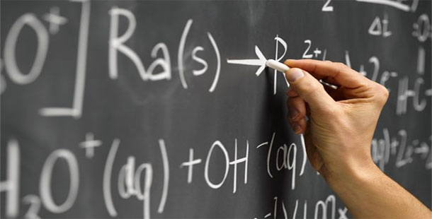 A hand writing on a blackboard, smart prodigies
