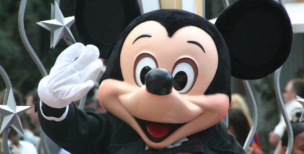 Live character version of mickey mouse waving