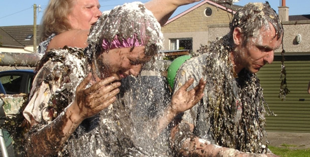 A strange wedding traditions covered in mud