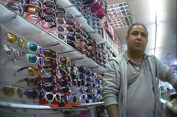 www.mirror.co.uk Grabs-showing-a-trader-selling-fake-goods-in-a-counterfeit-Manchester-store