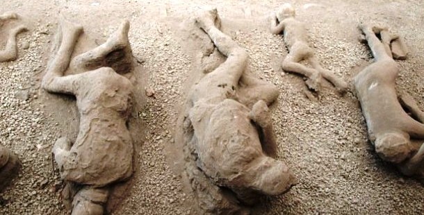 A group of huperson figures made of sand