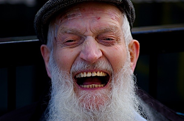 bearded man laughing