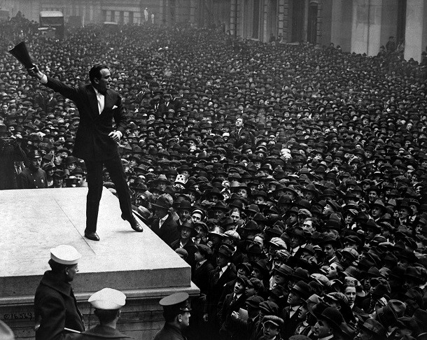 Douglas Fairbanks, movie star, speaking in front of the Sub-Treasury building, New York City, to aid the third Liberty Loan. April 1918.