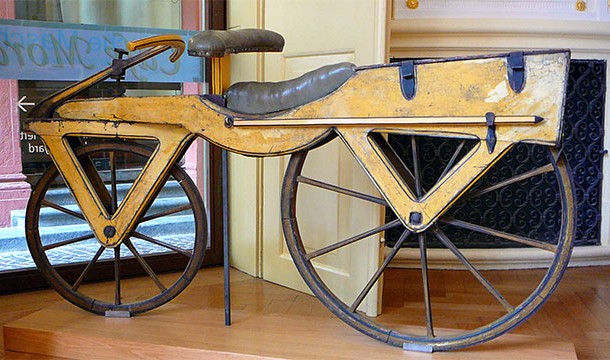 The precursor to the bike was the dandy horse, a bike looking vehicle that required the rider to push with his or her feet