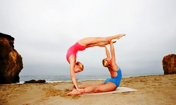 Women doing handstand