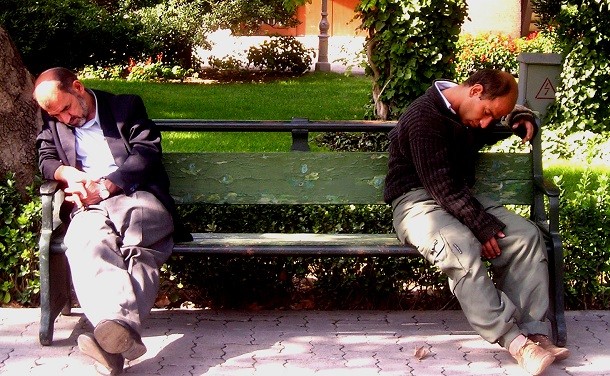 men sleeping in park