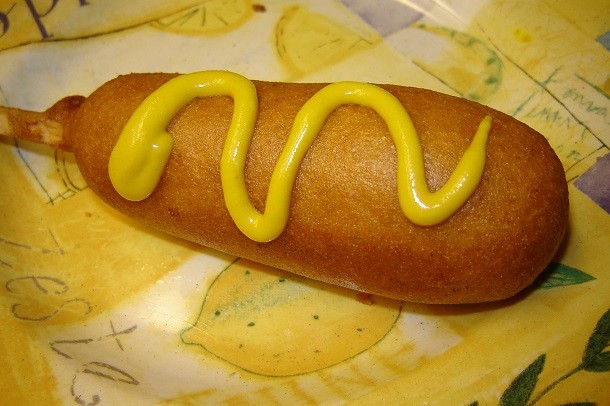 corn dog with mustard