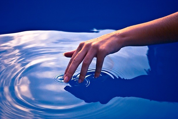fingers in water