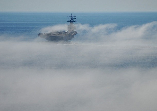 US_Navy_101105-N-5684M-121_The_aircraft_carrier_USS_Ronald_Reagan_(CVN_76)_maneuvers_through_fog_in_the_Pacific_Ocean