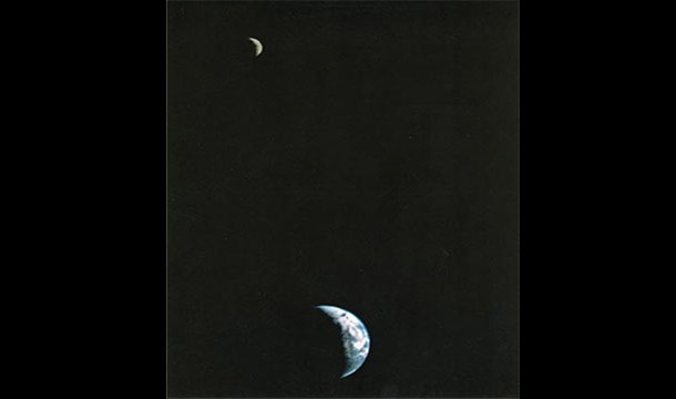 Thirteen days after setting out towards Jupiter, Voyager 1 took the first long distance photo of the Earth and moon together (1977)
