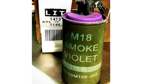 This live, purple smoke grenade found in a checked bag at Las Vegas McCarran International Airport