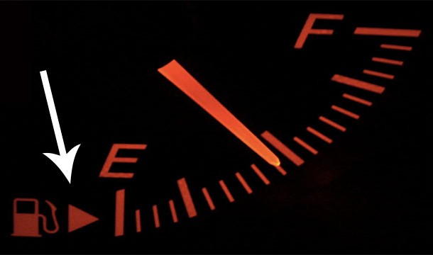 In case you're driving an unfamiliar car, the arrow next to the gas pump (on the speedometer) shows you which side the gas tank is on