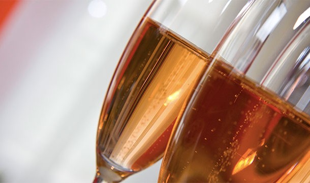 All Champagne is produced in the Champagne region of France. If it is produced elsewhere, then it is a local variant of sparkling wine